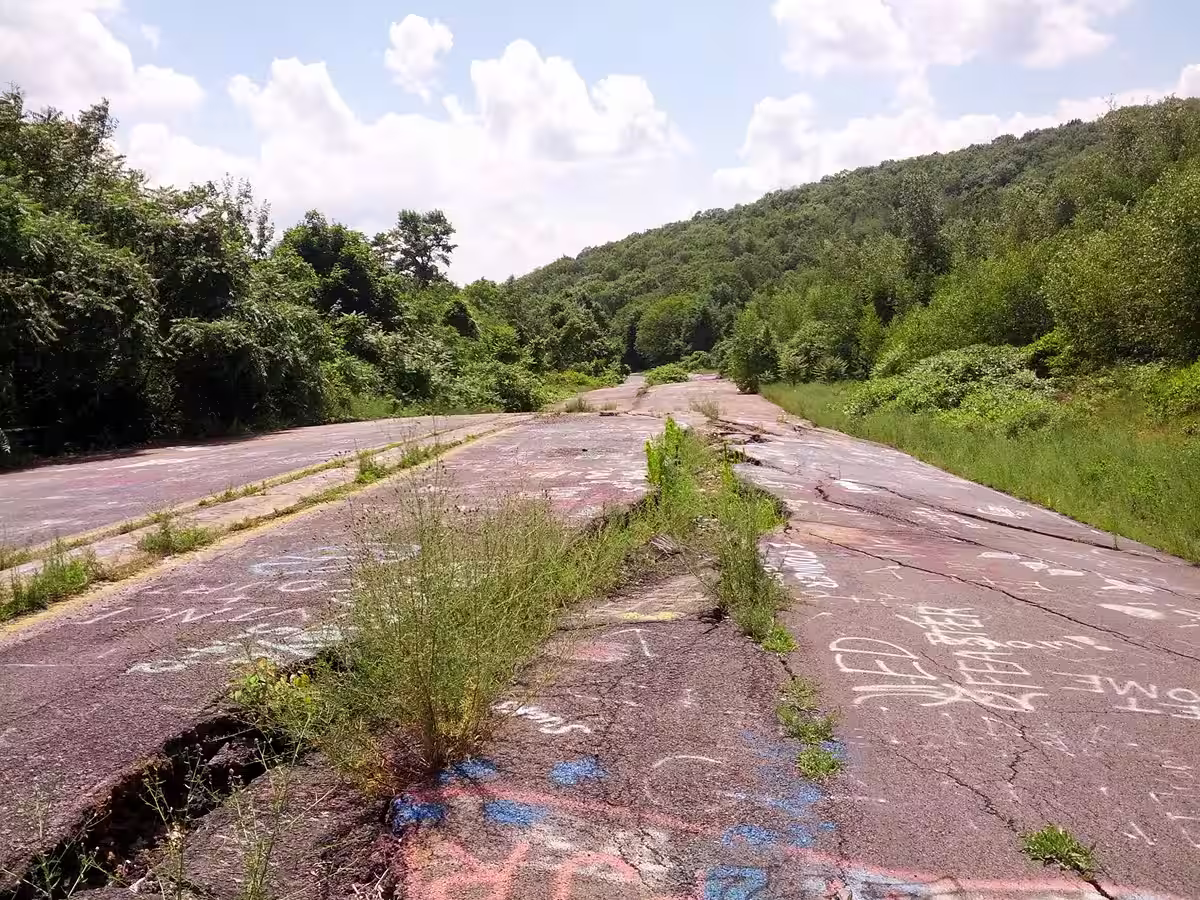 Graffiti highway on Old Route 61 in Centralia Pennsylvania, cracked by the underground mine fire below